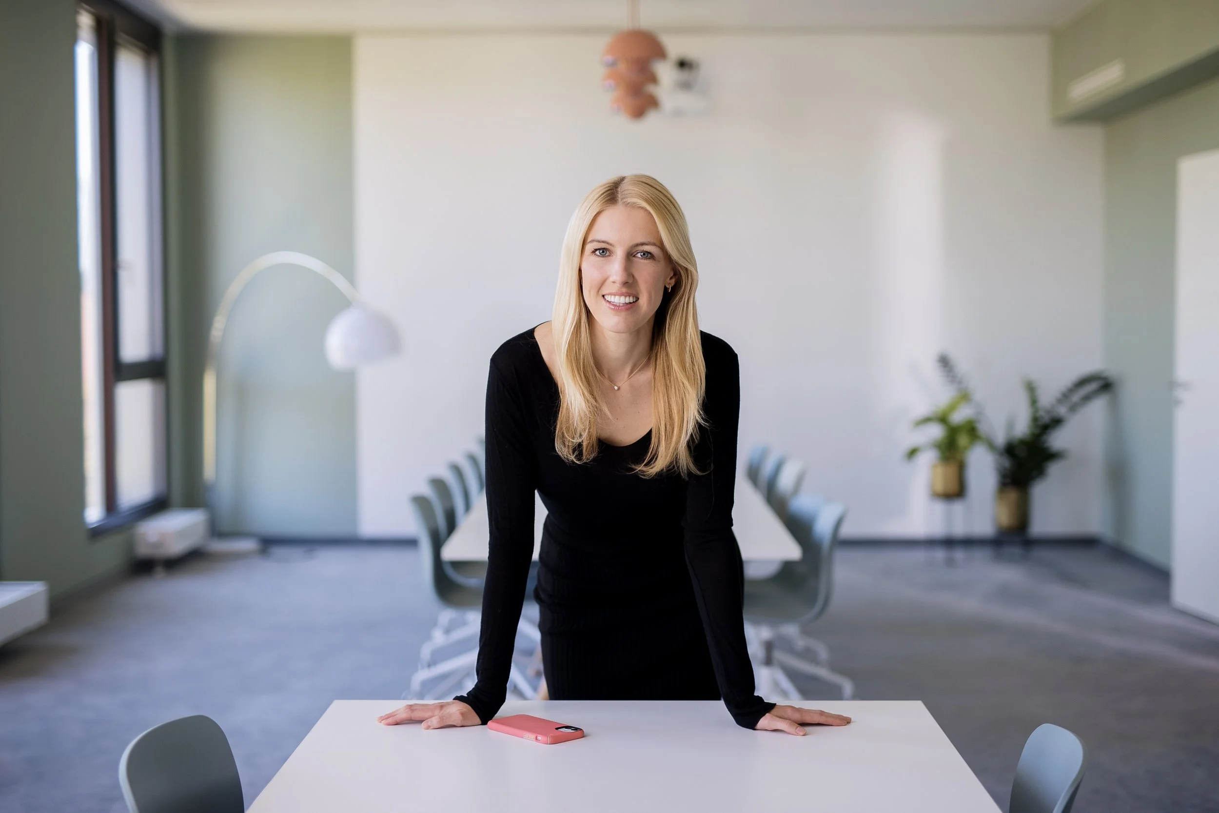 Kate Juenger in a founder boardroom setting